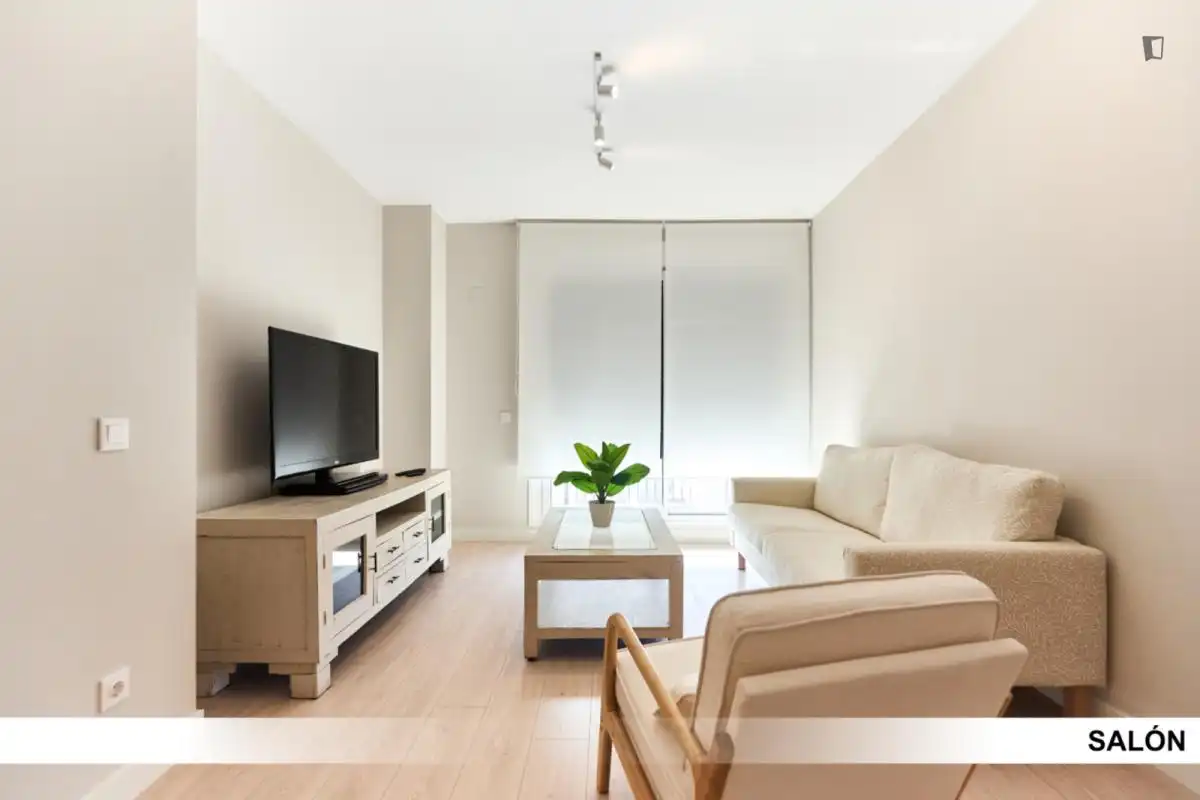 Sala d'estar de Apartament per a compartir en Dos Hermanas amb Aire condicionat, Calefacció i Moblat