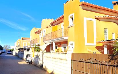 Exterior view of Single-family semi-detached for sale in Dénia  with Air Conditioner, Terrace and Swimming Pool