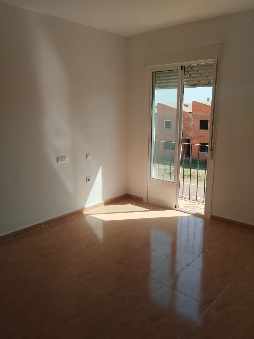 Sala de estar de Casa adosada en venta en La Albuera con Balcón