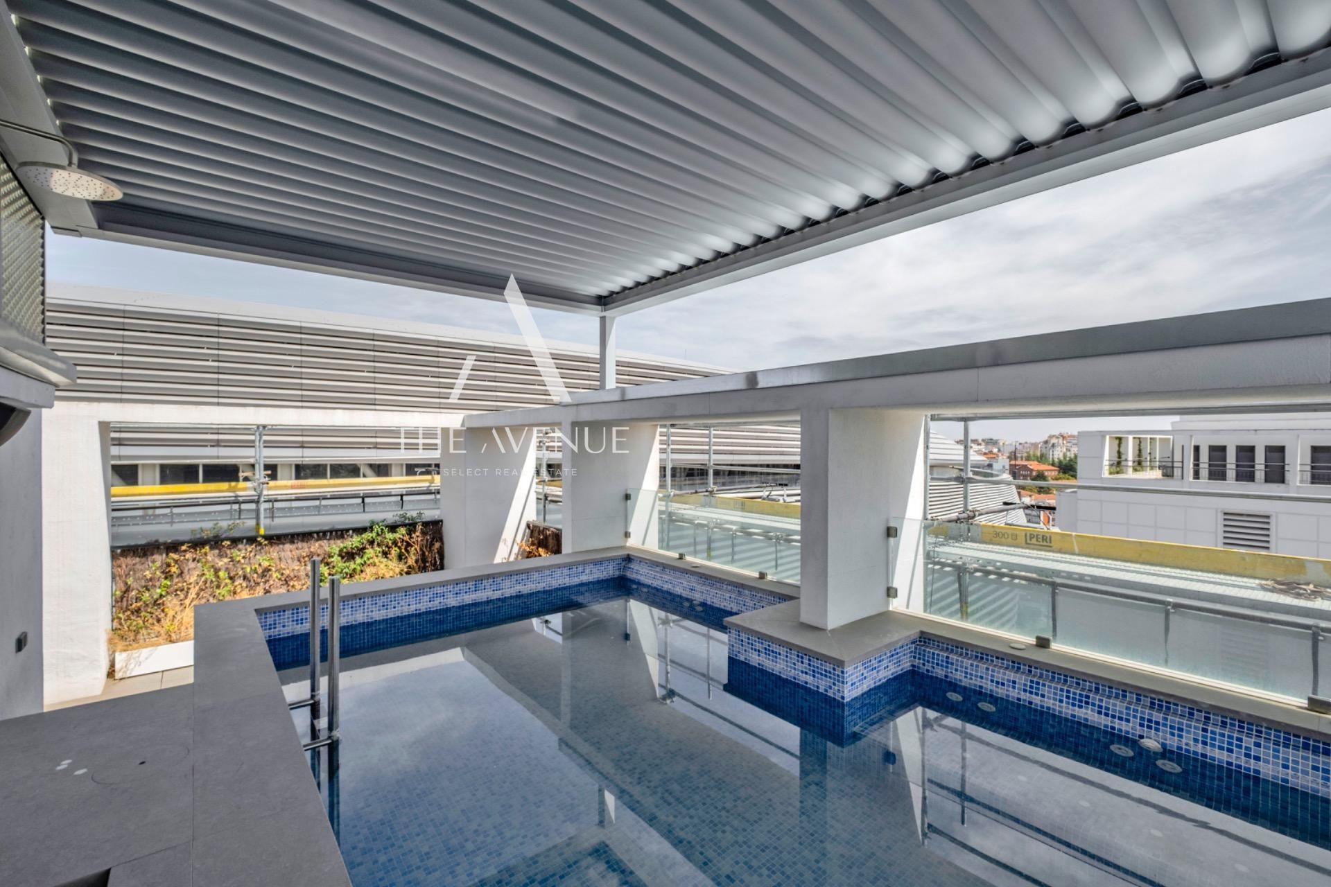 Swimming pool of Attic for sale in  Madrid Capital  with Air Conditioner, Heating and Terrace