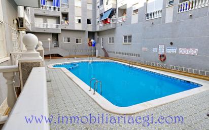 Swimming pool of Apartment for sale in Guardamar del Segura  with Air Conditioner, Heating and Terrace