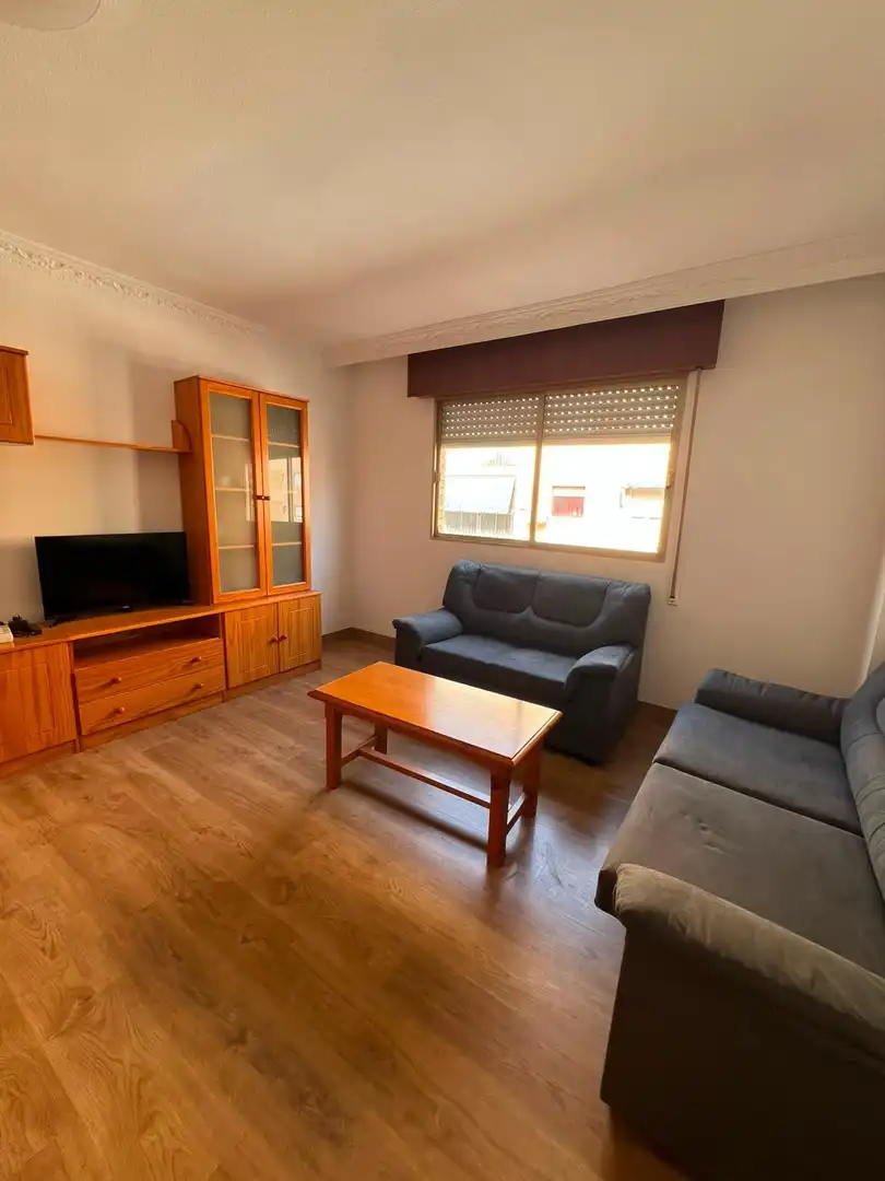 Sala d'estar de Apartament de lloguer en Almería amb Aire condicionat i Moblat