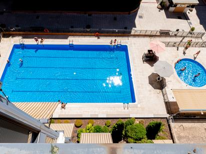 Swimming pool of Attic for sale in  Madrid Capital  with Air Conditioner and Terrace