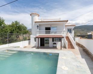Vista exterior de Casa o xalet en venda en Motril amb Aire condicionat, Jardí privat i Terrassa