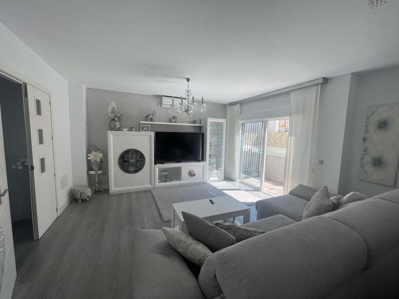 Living room of Single-family semi-detached for sale in Vélez-Málaga  with Air Conditioner, Terrace and Swimming Pool