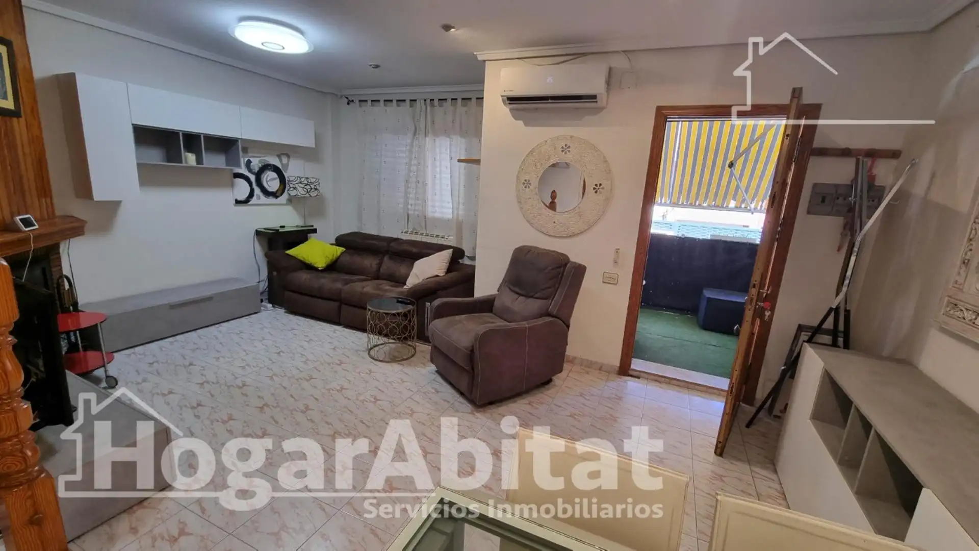 Sala de estar de Casa adosada en venta en Puçol con Aire acondicionado, Terraza y Trastero