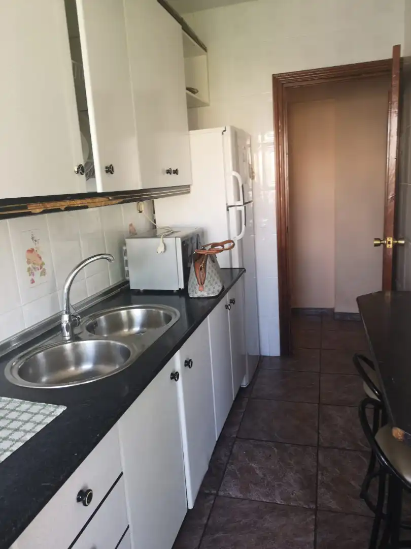 Küche von Wohnung zum Verkauf in Jaén mit Klimaanlage, Ofen und Waschmaschine