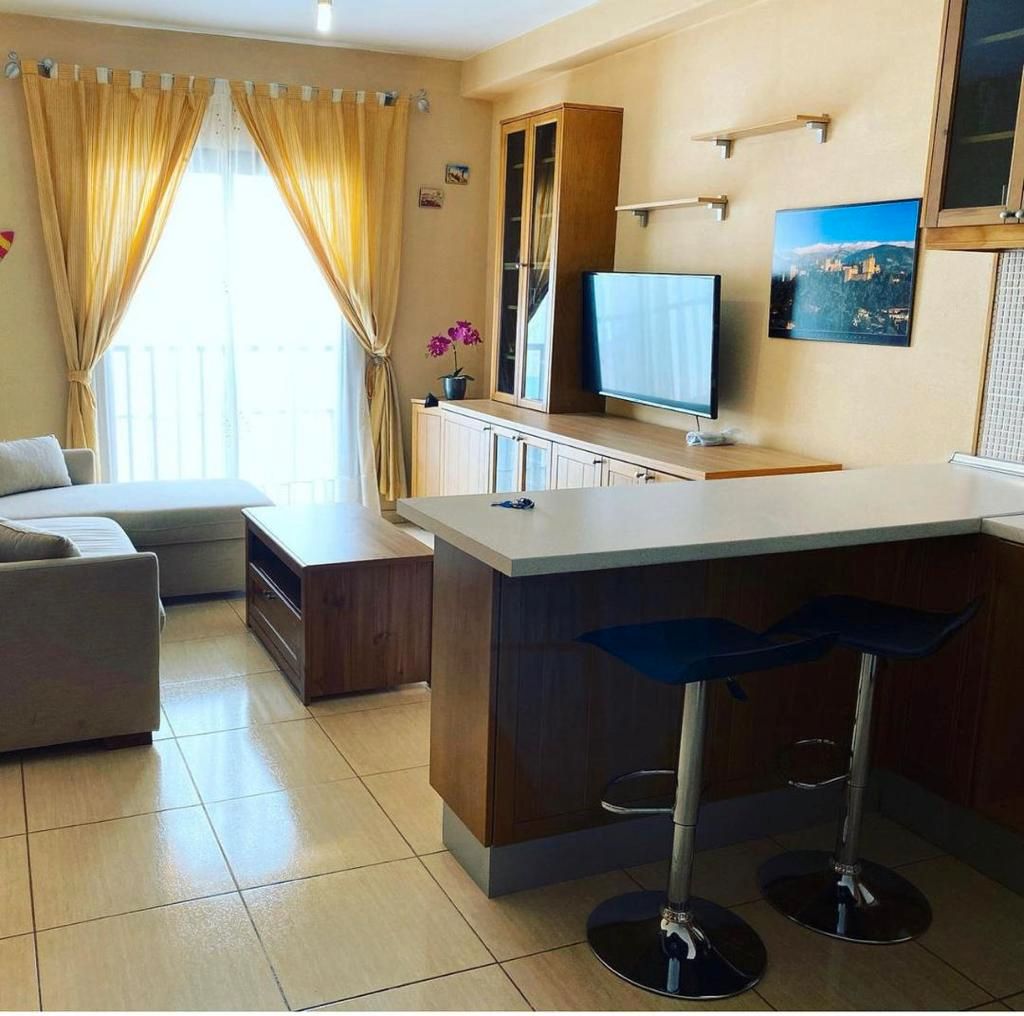 Sala d'estar de Apartament en venda en Santa Lucía de Tirajana amb Moblat, Rentadora i TV