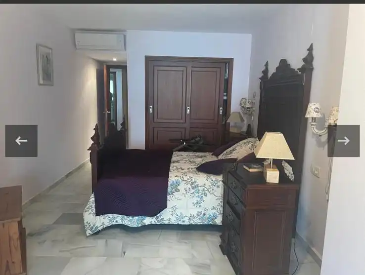 Habitación de Piso de alquiler en Estepona con Aire acondicionado, Terraza y Amueblado