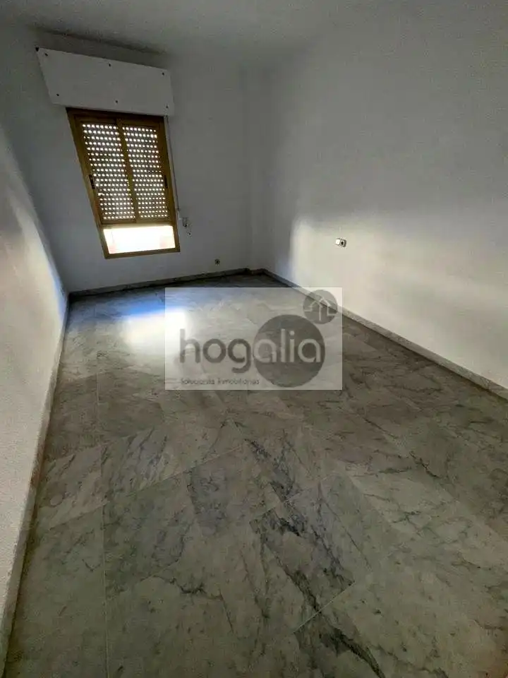 Dormitori de Pis de lloguer en Sevilla amb Aire condicionat i Piscina