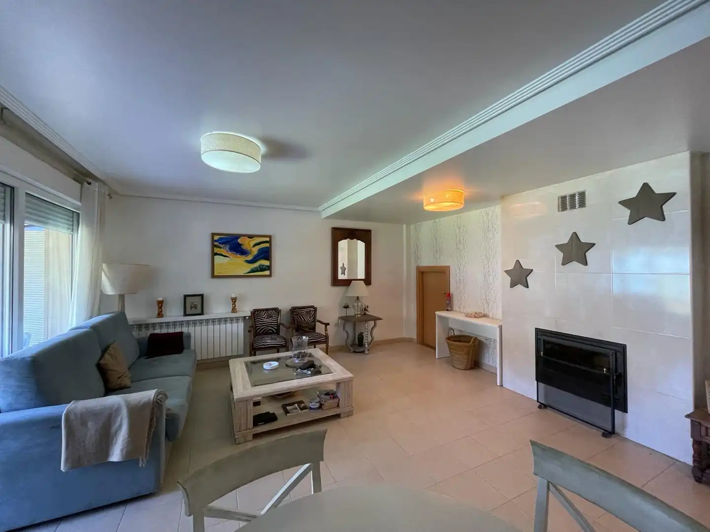 Sala de estar de Casa adosada en venta en San Leonardo de Yagüe con Calefacción, Jardín privado y Parquet
