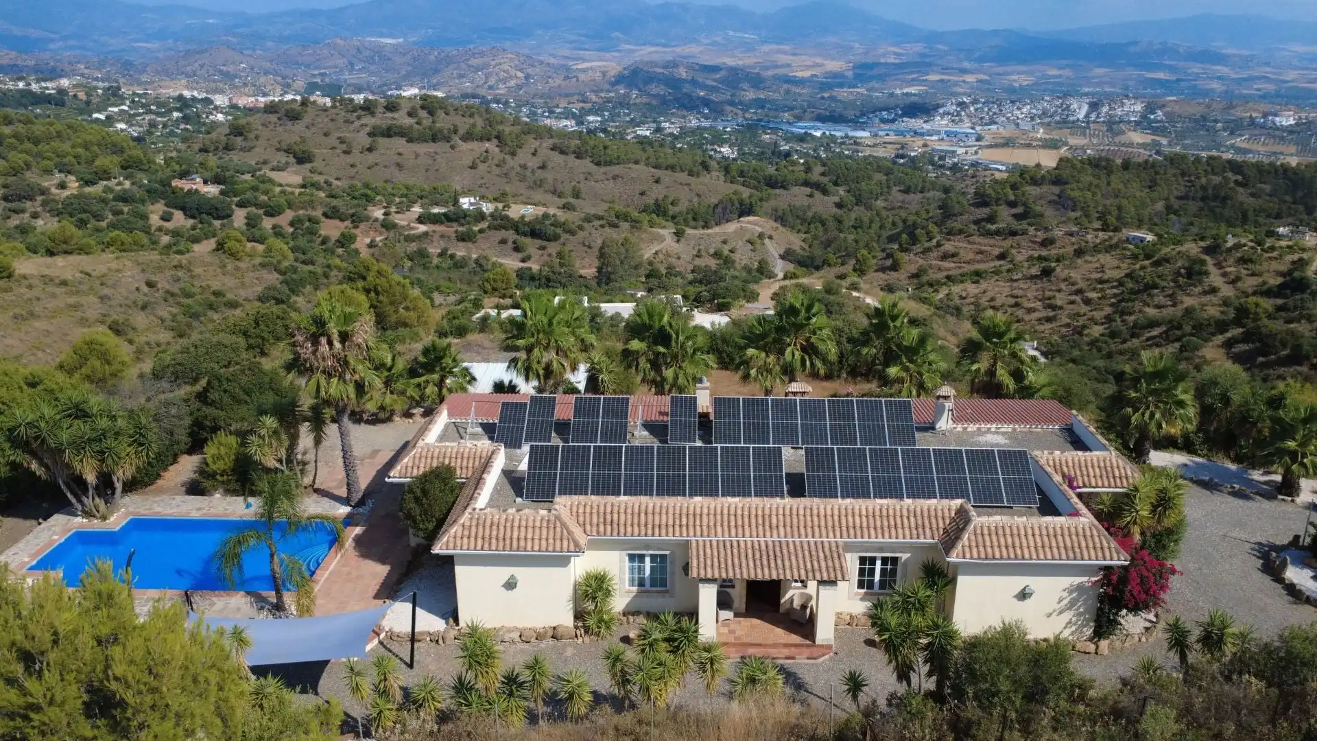 Casa rústica amb piscina en venda a Coín