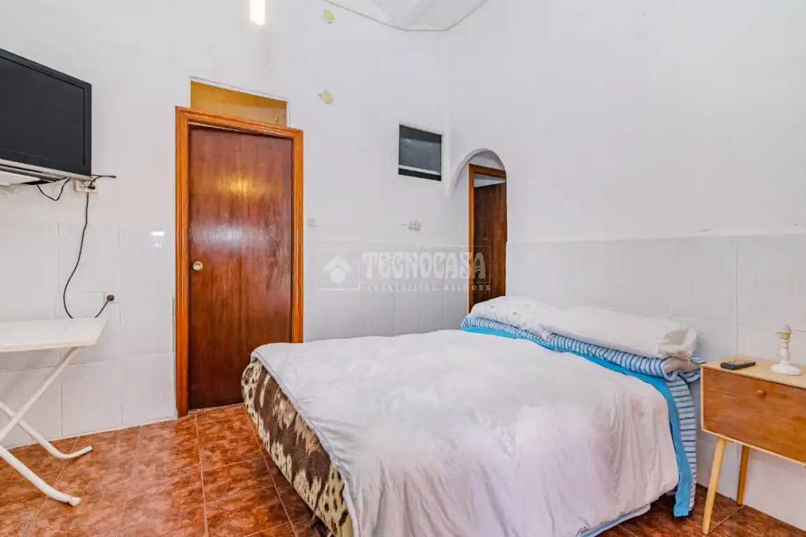 Habitación de Casa adosada en venta en Loja con Aire acondicionado, Calefacción y Jardín privado