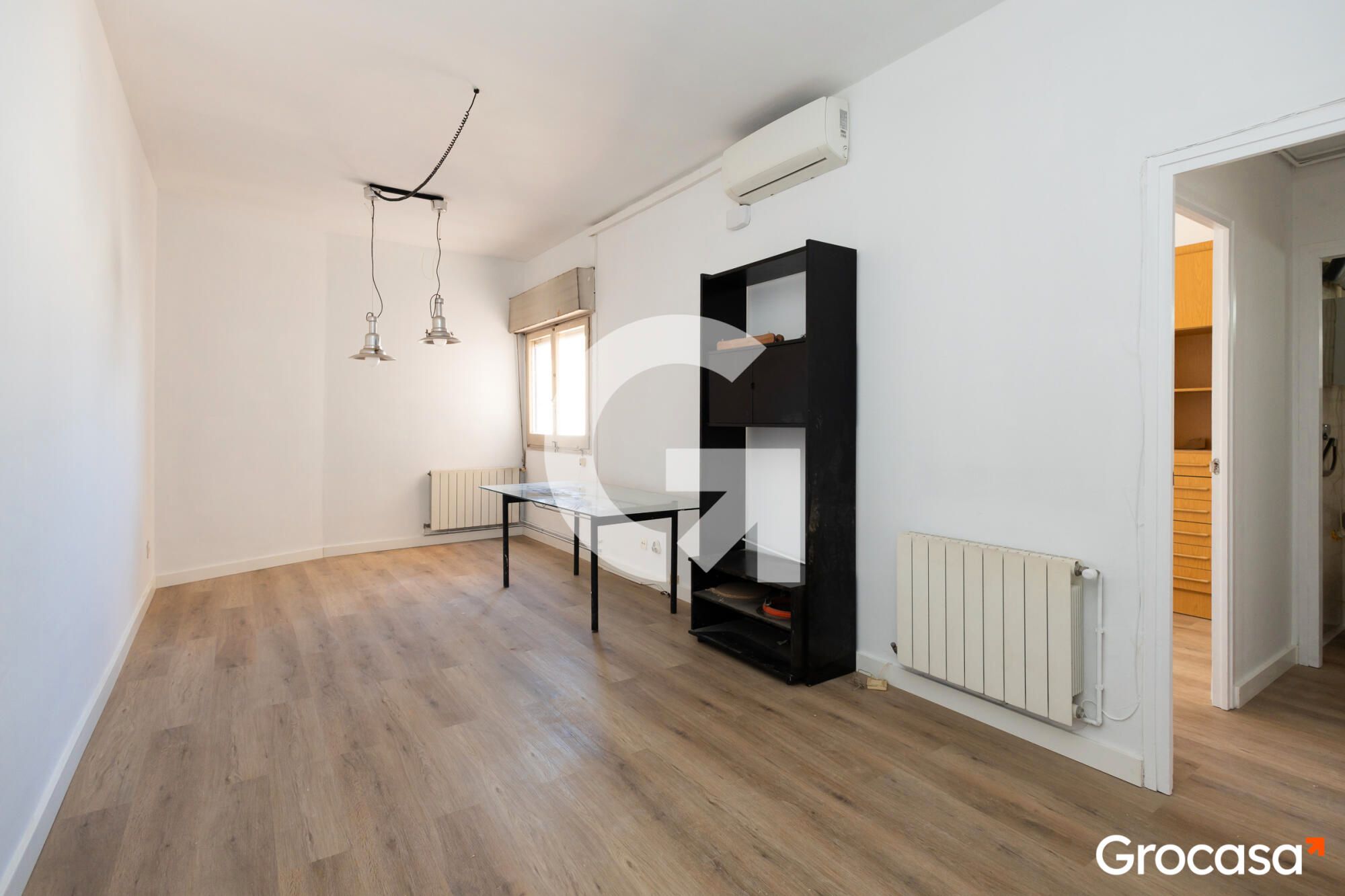 Sala d'estar de Pis en venda en L'Hospitalet de Llobregat amb Aire condicionat, Calefacció i Forn