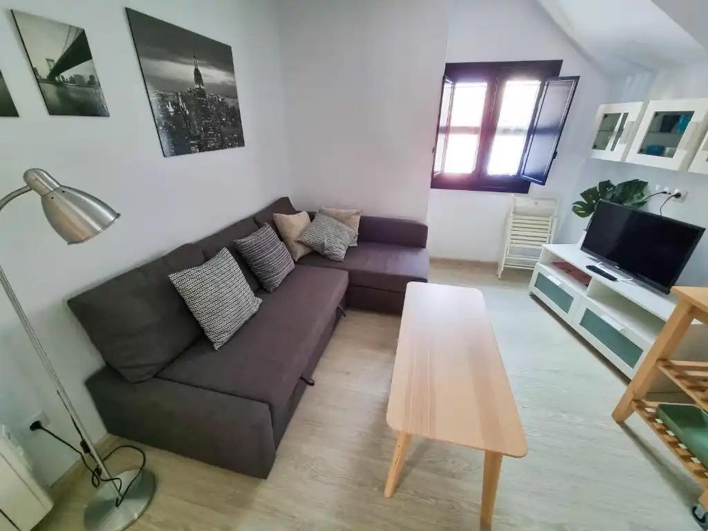 Sala de estar de Piso en venta en Cudillero con Calefacción, Parquet y Amueblado