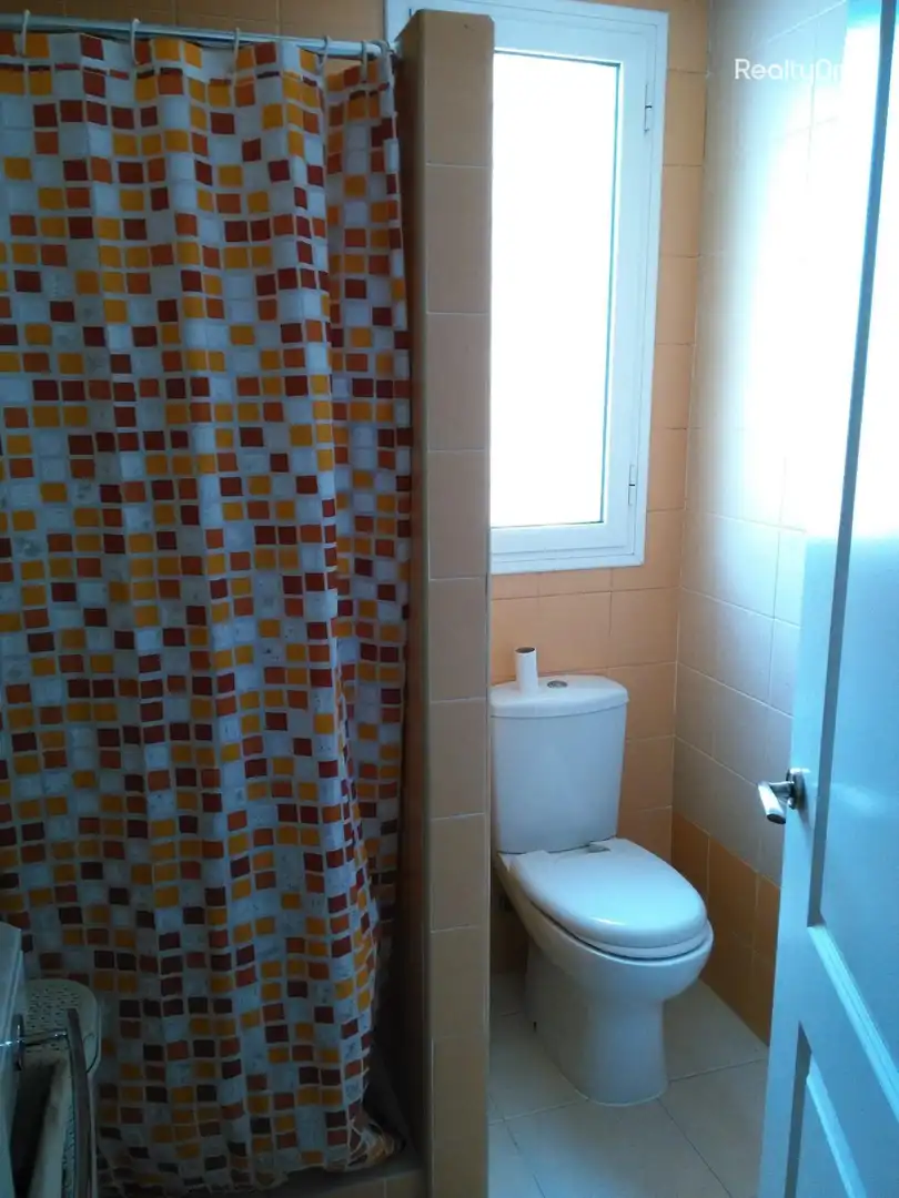 Baño de Casa adosada en venta en Umbrete con Aire acondicionado, Calefacción y Jardín privado