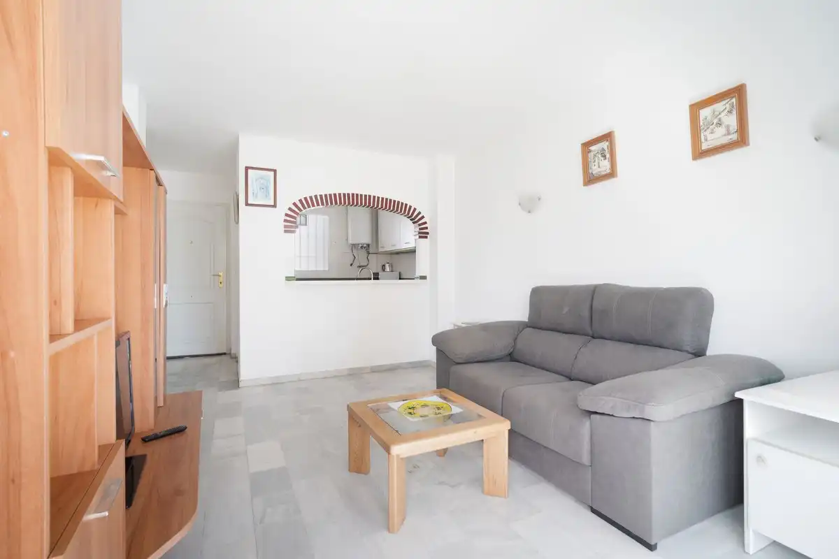 Sala d'estar de Apartament en venda en Torremolinos amb Aire condicionat i Piscina comunitària