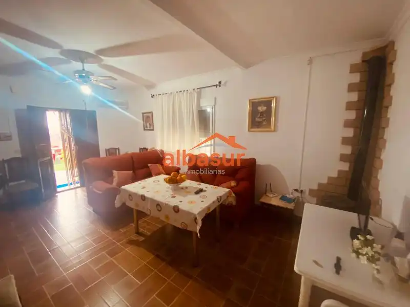 Sala de estar de Casa o chalet en venta en La Carlota con Aire acondicionado, Jardín privado y Piscina