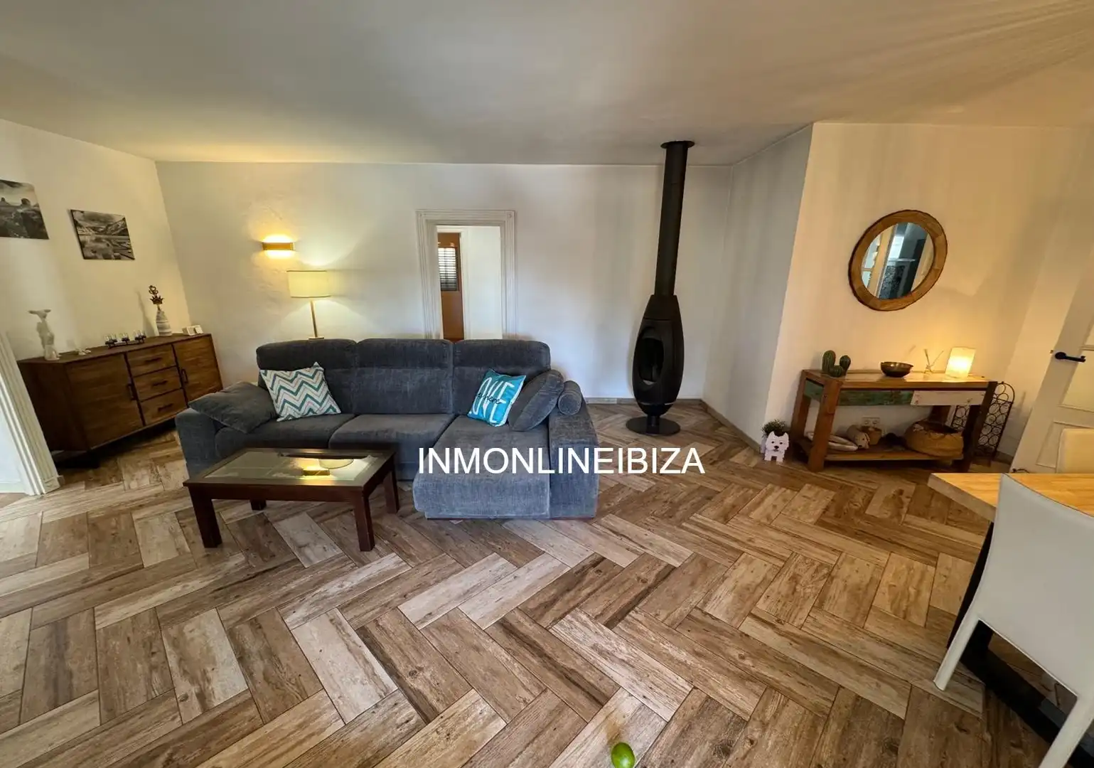 Sala d'estar de Casa o xalet en venda en Sant Antoni de Portmany amb Aire condicionat, Jardí privat i Terrassa