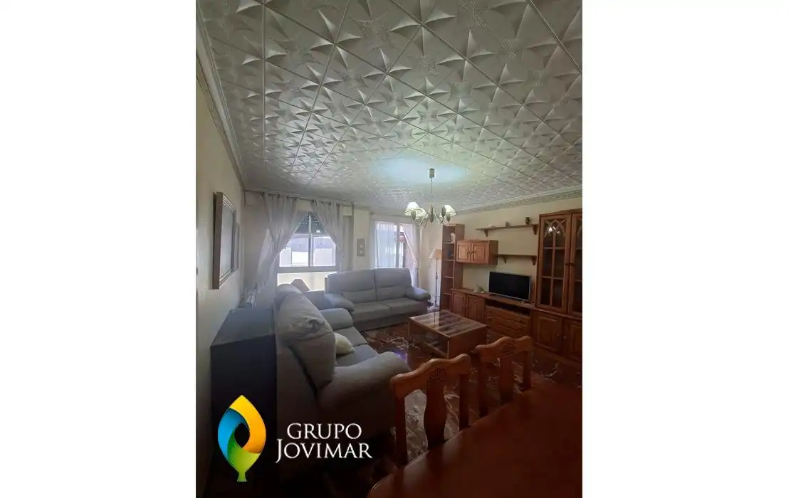 Sala de estar de Piso en venta en Guadix con Calefacción, Terraza y Amueblado
