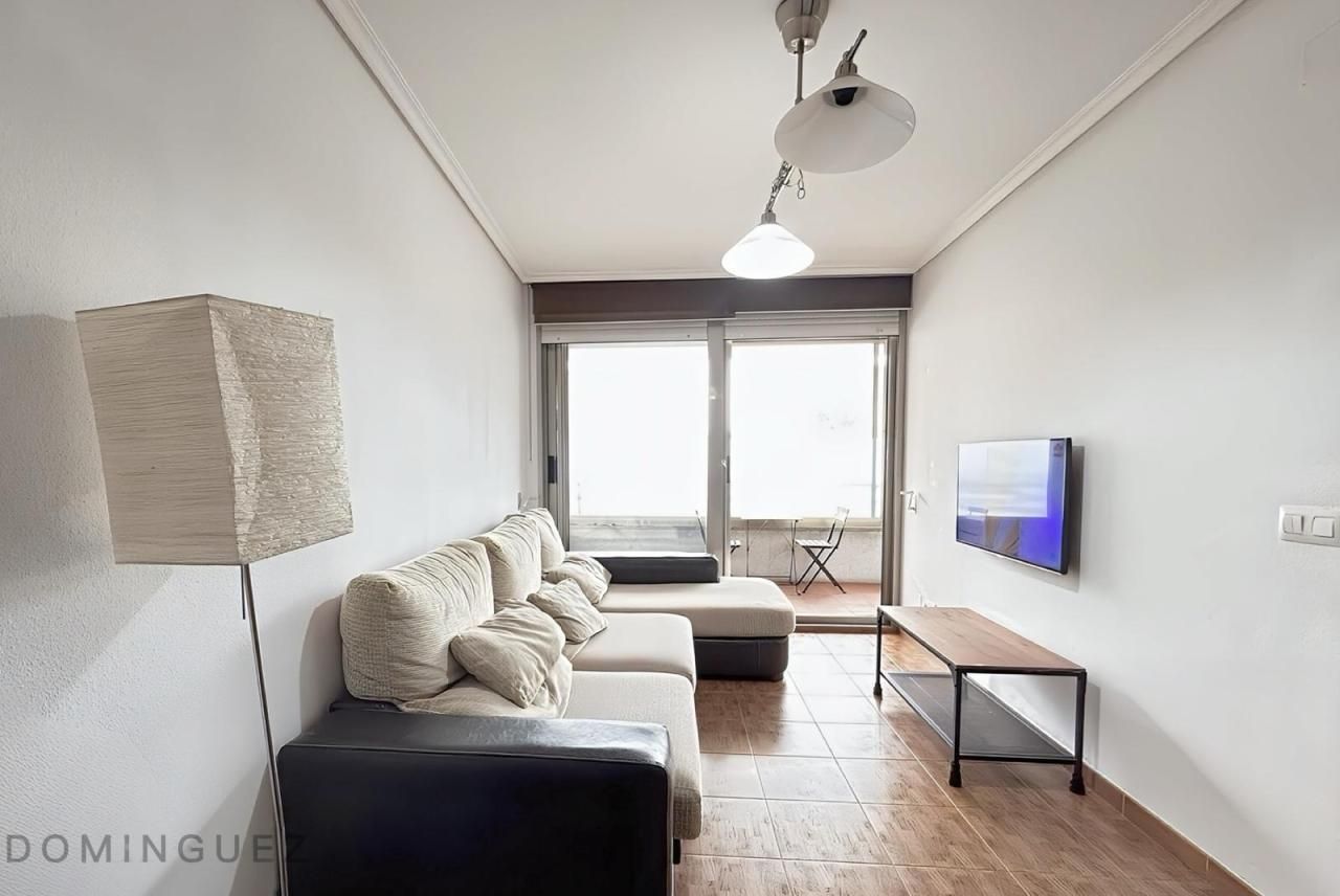 Living room of Flat for sale in Cangas   with Heating, Terrace and Furnished