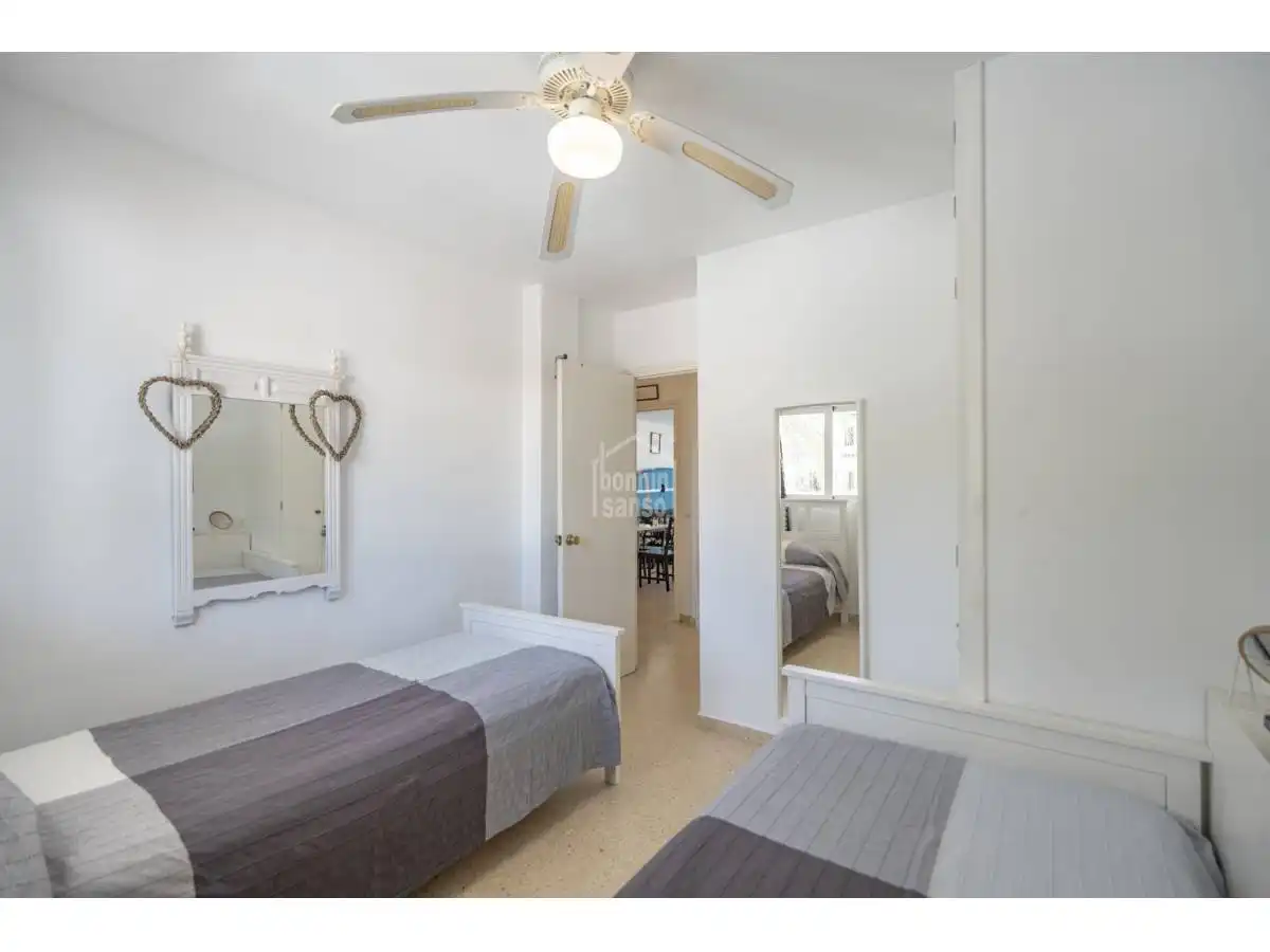 Dormitori de Apartament en venda en Es Migjorn Gran amb Terrassa i Moblat