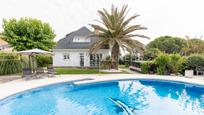 Exterior view of House or chalet for sale in Villaviciosa de Odón  with Air Conditioner, Heating and Private garden