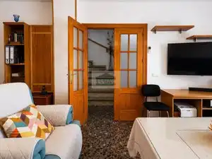 Sala de estar de Casa adosada en venta en Vegas del Genil con Aire acondicionado, Calefacción y Jardín privado