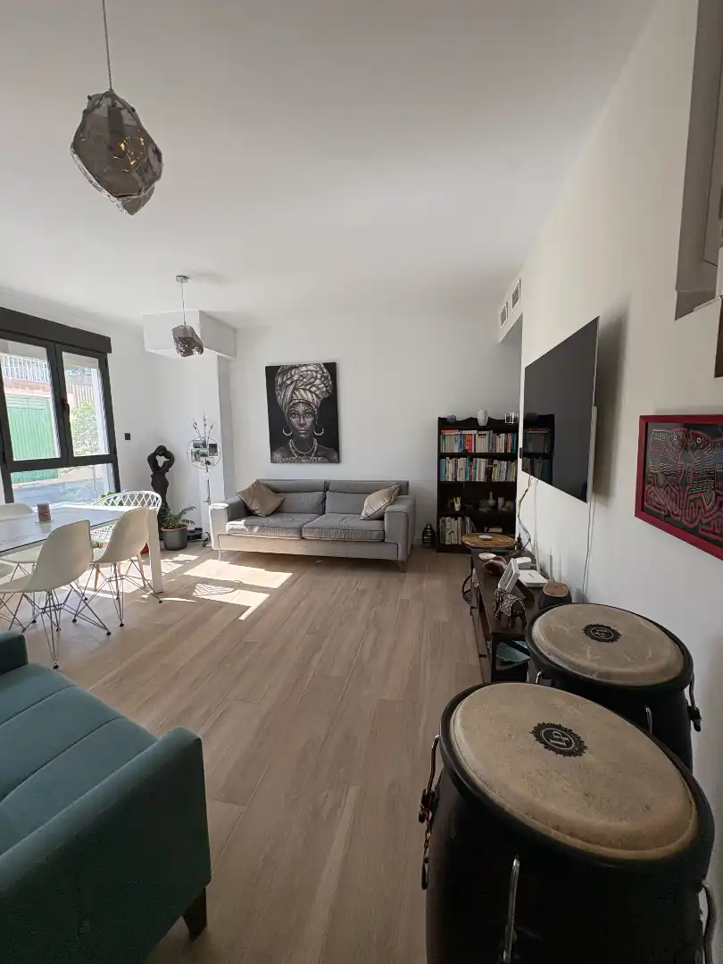 Sala d'estar de Casa adosada en venda en Alcantarilla amb Aire condicionat, Terrassa i Traster