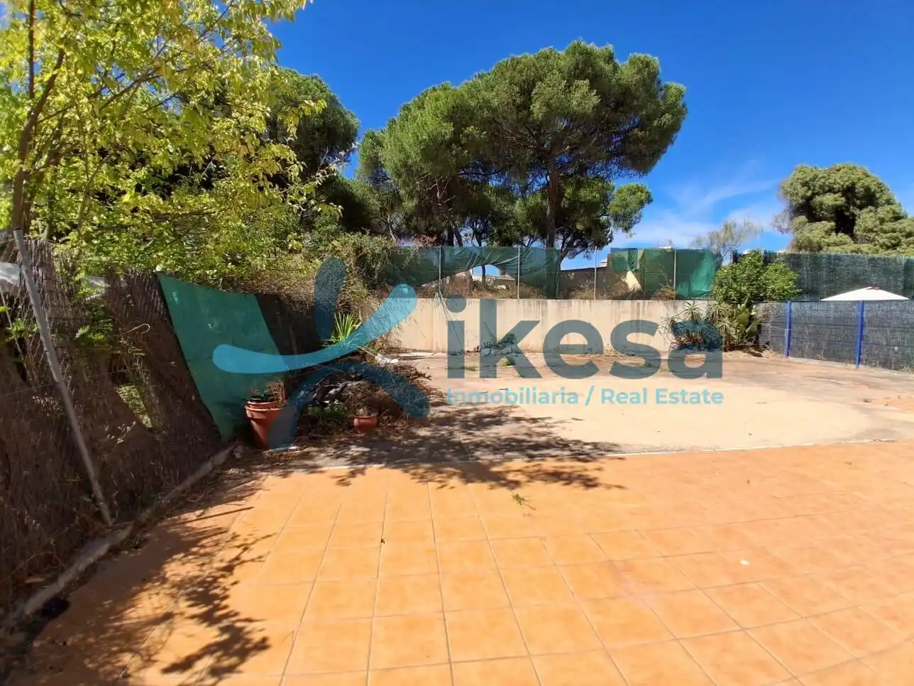 Vista exterior de Casa adosada en venda en El Portil amb Piscina comunitària