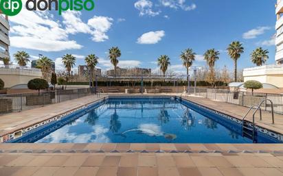 Swimming pool of Flat for sale in  Granada Capital  with Heating, Parquet flooring and Balcony