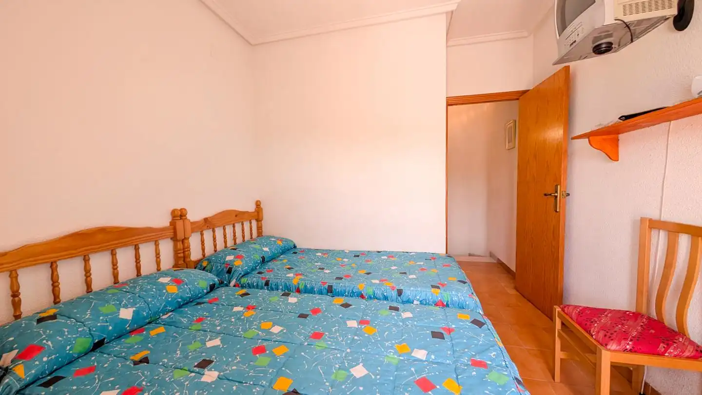 Dormitori de Casa adosada en venda en Santa Pola amb Aire condicionat, Jardí privat i Terrassa