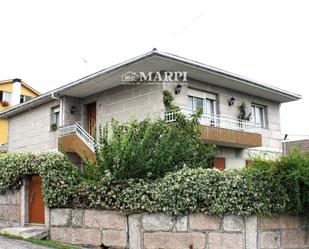 Vista exterior de Casa o xalet en venda en O Porriño   amb Calefacció, Jardí privat i Terrassa