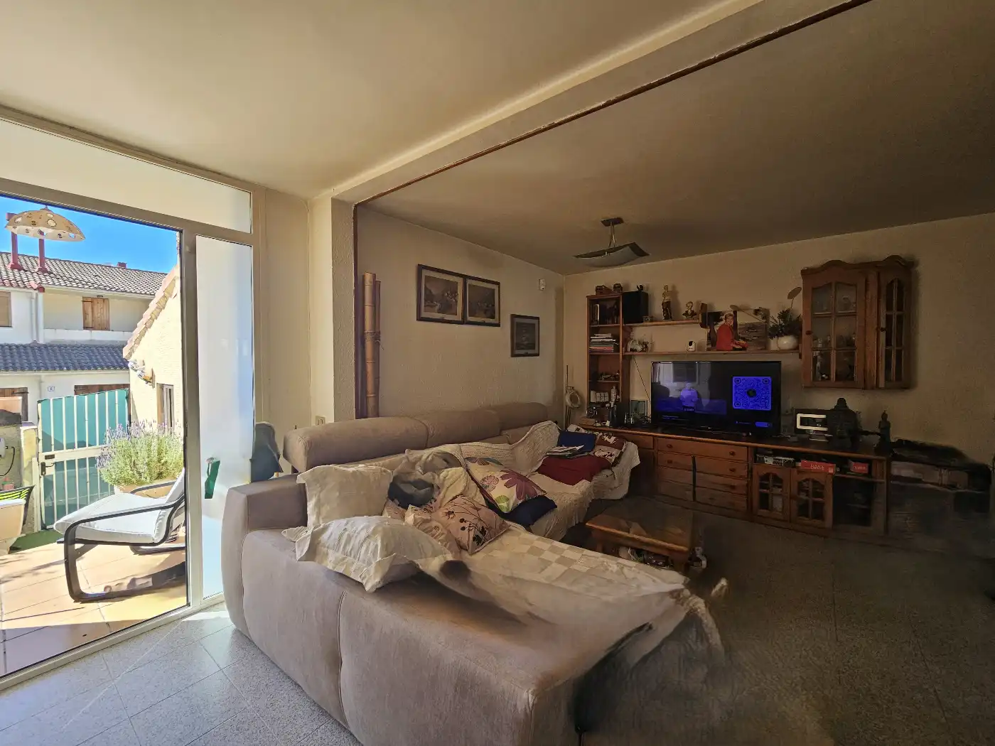 Sala d'estar de Casa adosada en venda en Els Pallaresos amb Aire condicionat, Jardí privat i Terrassa