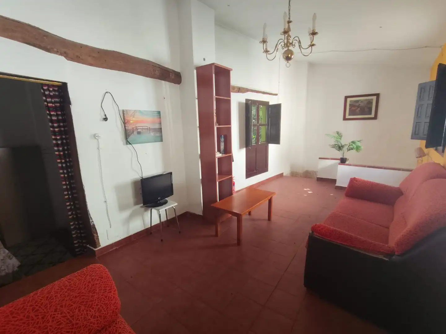 Sala d'estar de Casa o xalet en venda en Guadix amb Traster i Moblat