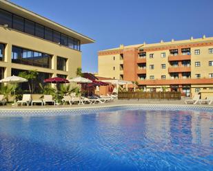 Piscina de Apartament de lloguer en Punta Umbría amb Aire condicionat