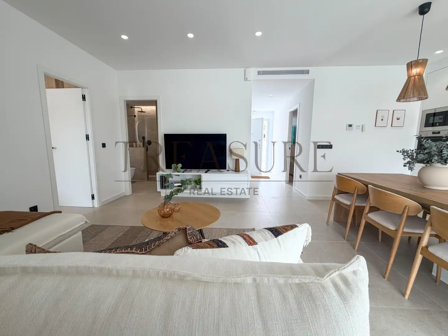 Sala d'estar de Planta baixa en venda en Pilar de la Horadada amb Aire condicionat, Jardí privat i Terrassa