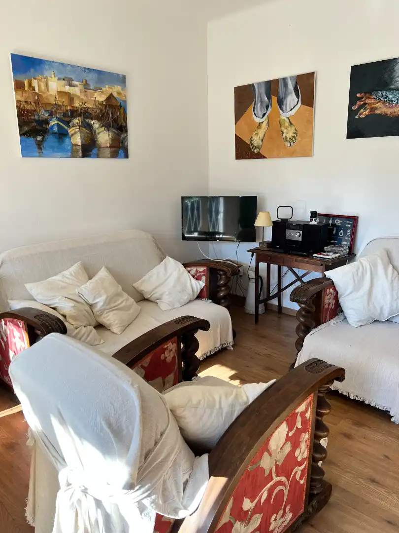 Sala d'estar de Casa adosada en venda en Torredembarra amb Aire condicionat, Jardí privat i Terrassa