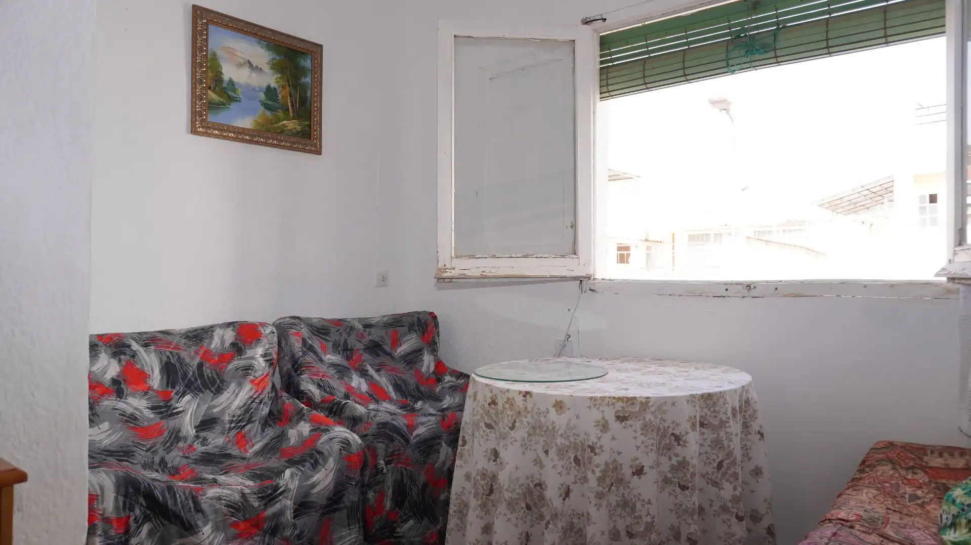 Sala d'estar de Casa adosada en venda en Motril amb Terrassa i Moblat