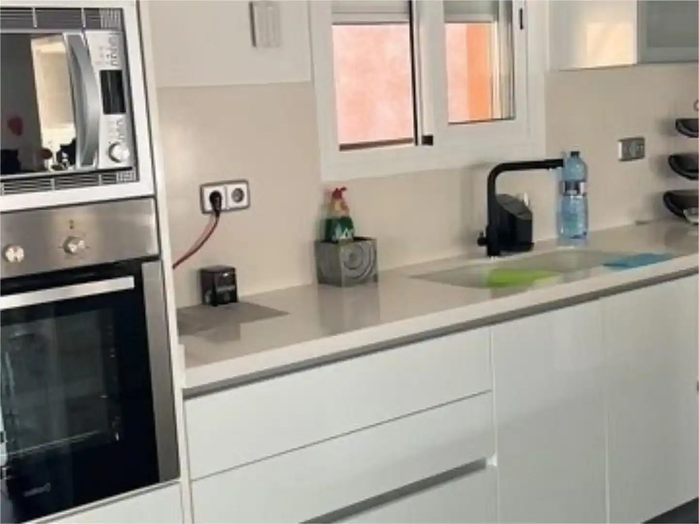 Küche von Einfamilien-Reihenhaus zum Verkauf in Cunit mit Klimaanlage, Schwimmbad und Balkon