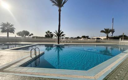 Swimming pool of Flat for sale in La Manga del Mar Menor  with Air Conditioner, Heating and Private garden