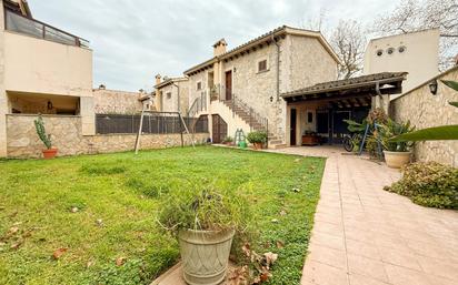 Exterior view of Single-family semi-detached for sale in Puigpunyent  with Air Conditioner, Heating and Private garden