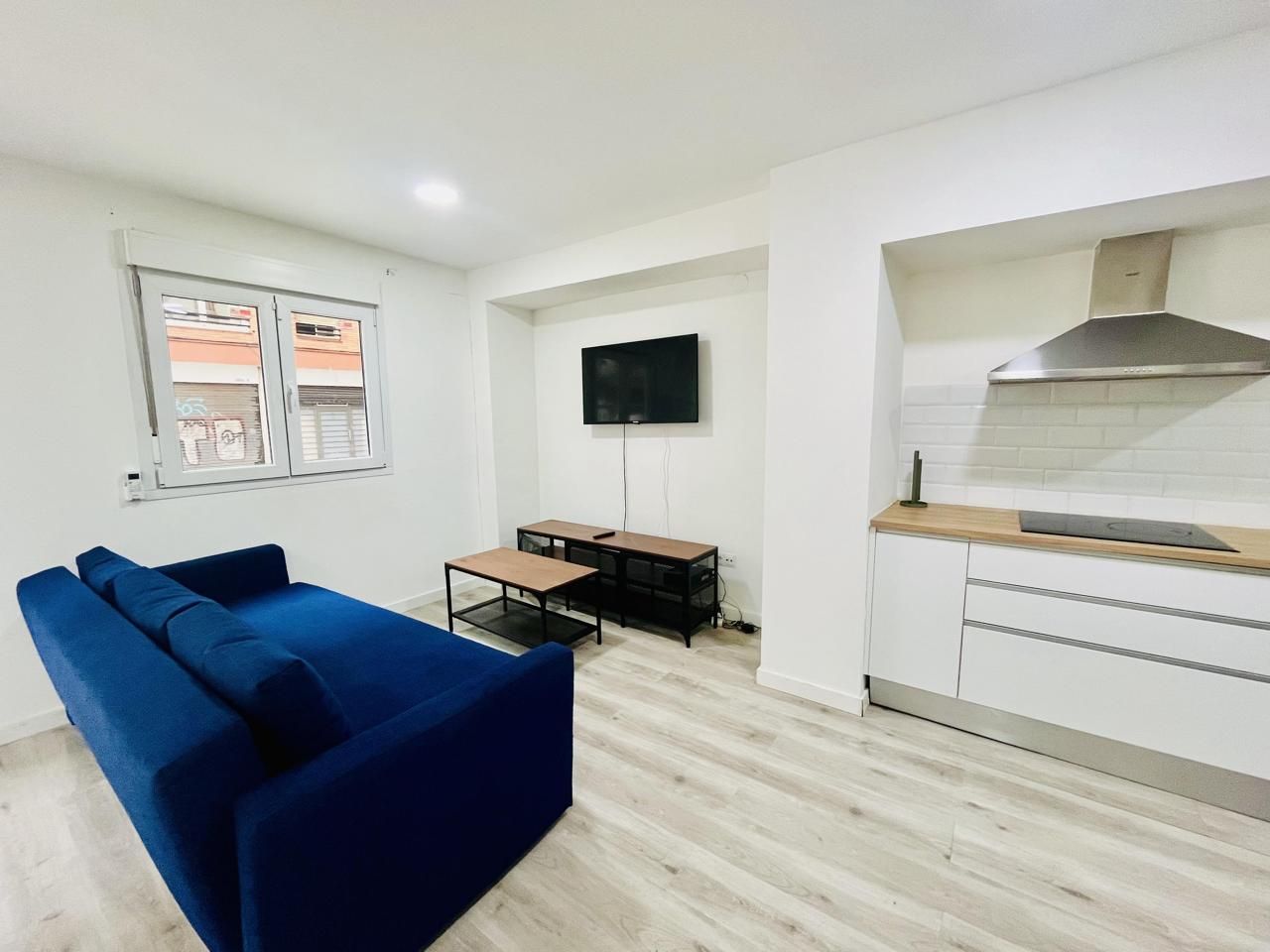 Living room of Planta baja for sale in  Barcelona Capital  with Air Conditioner and Furnished