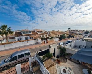 Vista exterior de Casa adosada en venda en Orihuela amb Jardí privat, Terrassa i Piscina comunitària