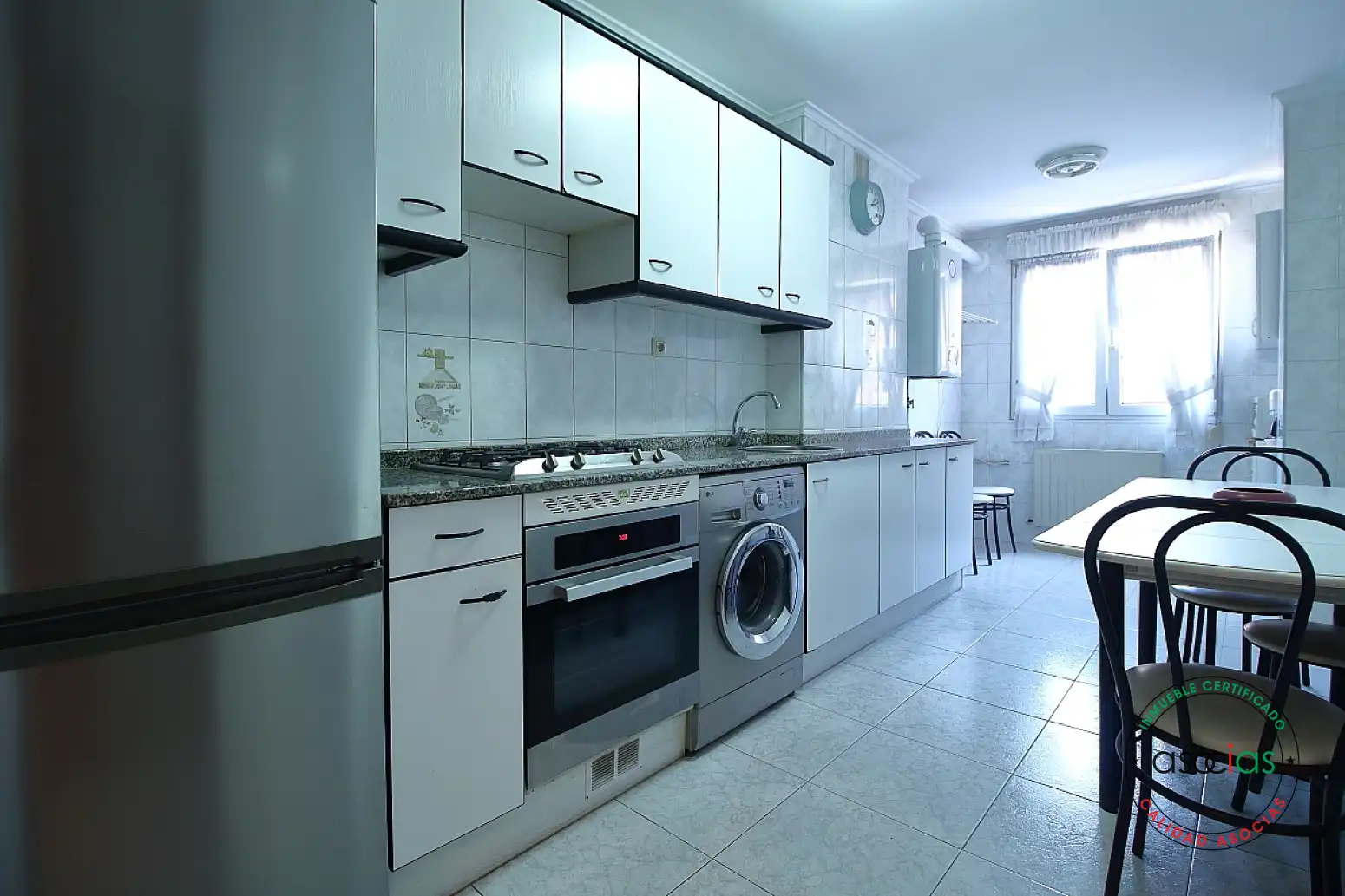 Kitchen of Flat for sale in Gijón   with Heating, Parquet flooring and Storage room