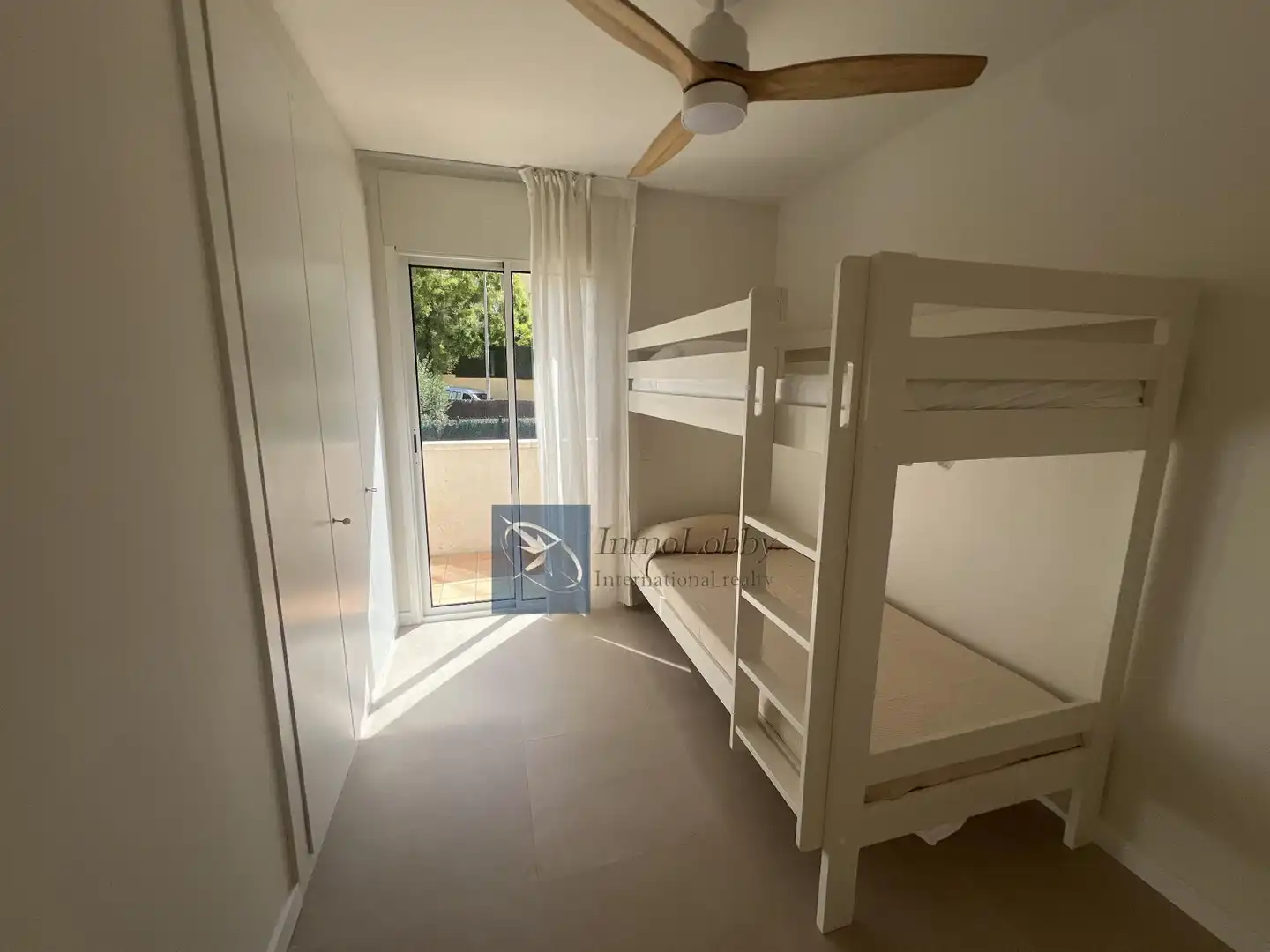 Dormitori de Apartament de lloguer en Castell d'Aro, Platja d'Aro i s'Agaró amb Aire condicionat, Terrassa i Piscina comunitària