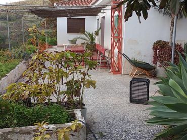 Casa rústica amb jardí en venda a El Rescate - Río Seco