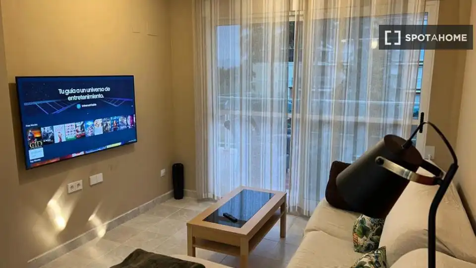 Sala d'estar de Apartament per a compartir en Dénia amb Aire condicionat, Calefacció i Terrassa