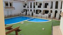 Swimming pool of Duplex for sale in San Pedro del Pinatar  with Air Conditioner, Terrace and Storage room