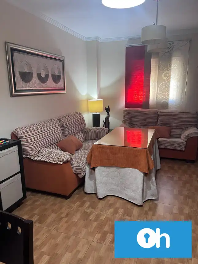 Sala de estar de Piso en venta en San Juan del Puerto con Aire acondicionado, Trastero y Amueblado